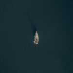 aerial view of boat on sea during daytime
